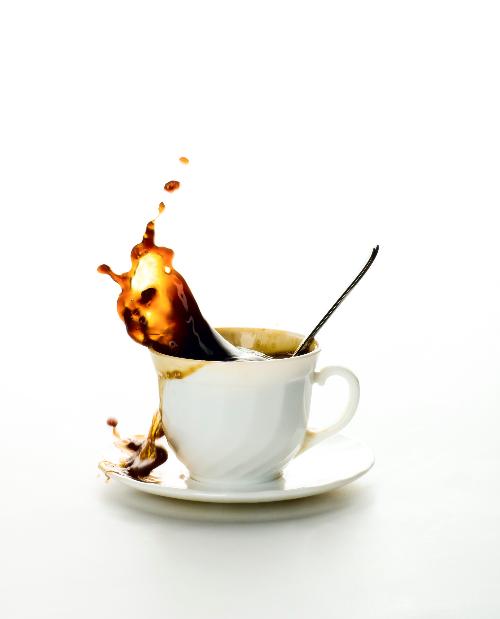091009-coffee-splashing-from-white-coffee-cup22510_size_261610984